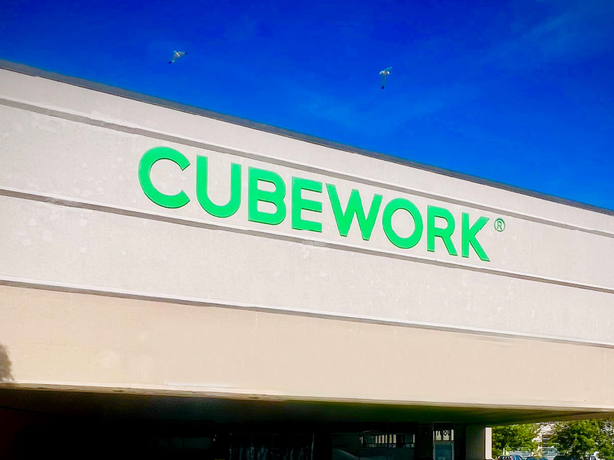 Custom acrylic office sign for Cubework designed by SignFreaks.