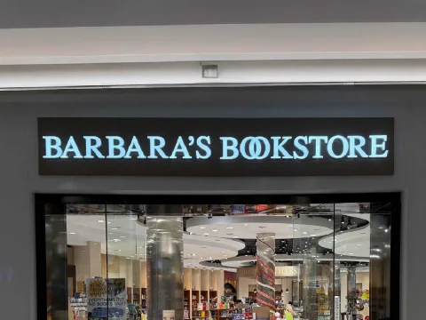 CNC router sign for Barbara's Bookstore Chicago by SignFreaks, showcasing bookstore branding.