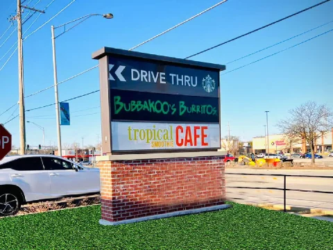 Custom monument sign installed at commercial property entrance