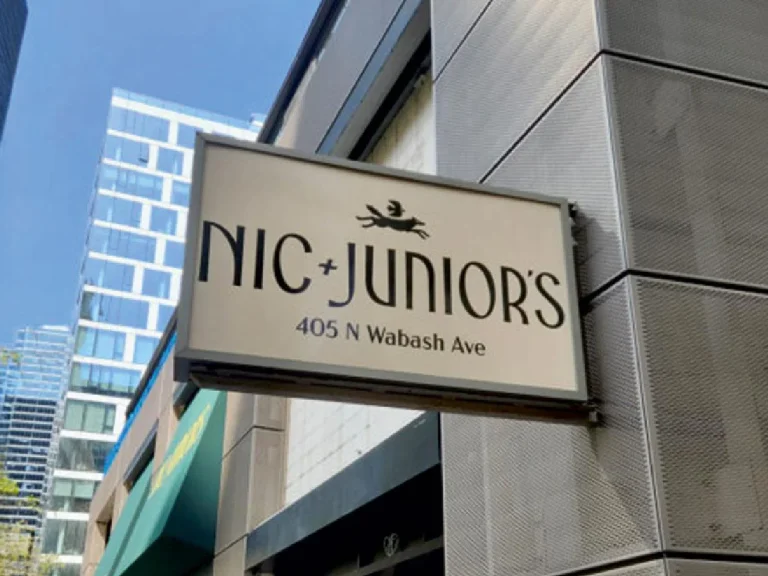 Blade sign for Nick & Juniors Chicago by SignFreaks, improving business visibility.
