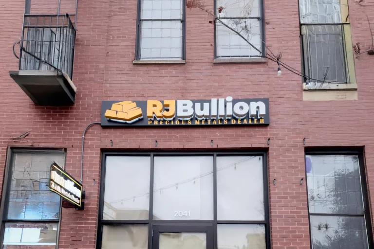 CNC router signs for RJ Bullion, a U.S. precious metals dealer, designed and installed by SignFreaks.