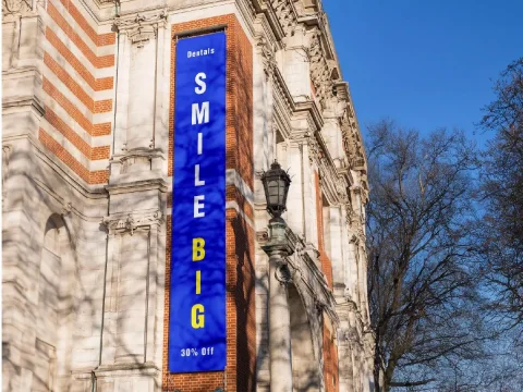 Smile Big Large Format Vinyl Banner in Chicago, built and installed by SignFreaks