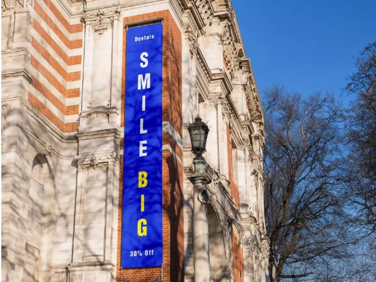 Smile Big Large Format Vinyl Banner in Chicago, built and installed by SignFreaks