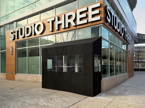 Studio Three enclosures in Chicago professionally installed by SignFreaks signage company